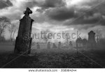 stock-photo-old-creepy-graveyard-on-stormy-winter-day-in-black-and-white-358984244