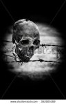 stock-photo-still-life-with-human-skull-on-barb-wire-362605169